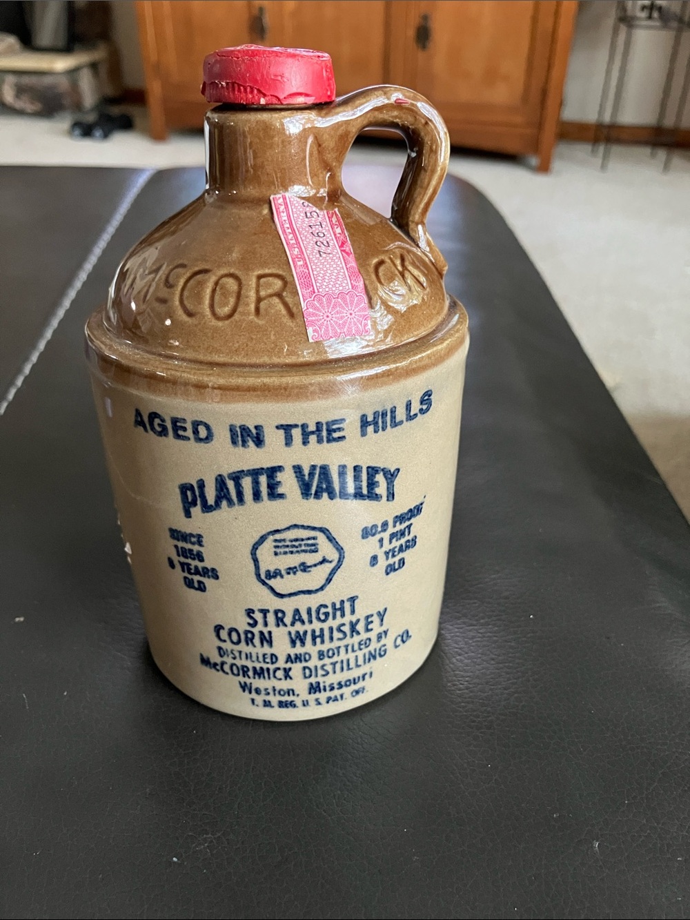 McCormick Straight Corn Whiskey Pint Jug, Aged in the Hills Platte Valley.